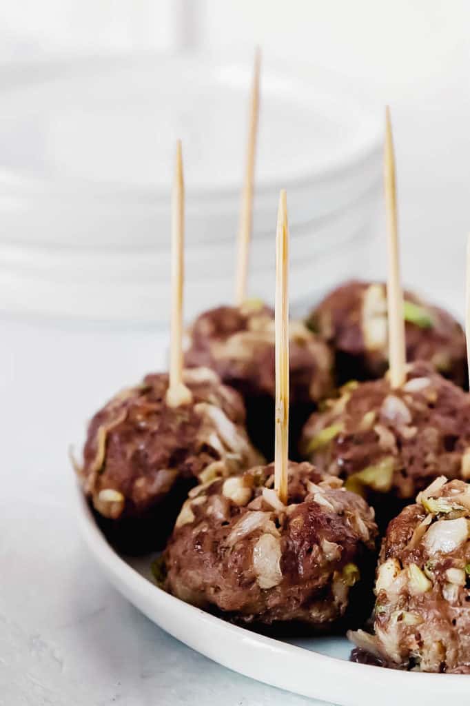 Appetizer plate with AIP Beef Meatballs and toothpicks