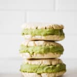 three matcha ice cream sandwiches stacked on top each other