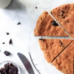 Sweet Potato Cookie Bar sliced into triangles with scattered carob chunks