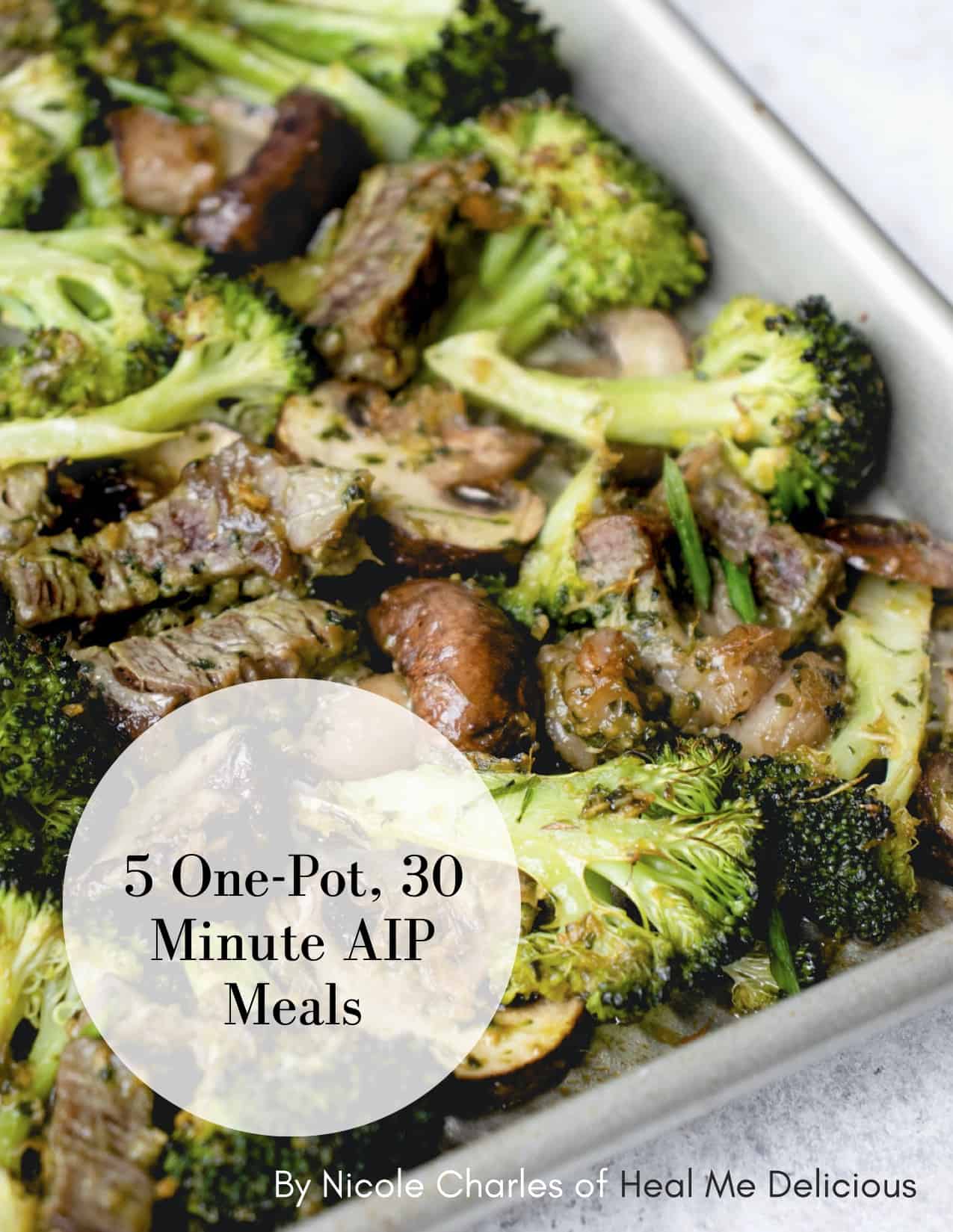 beef, broccoli and mushrooms on a stainless steel sheet pan