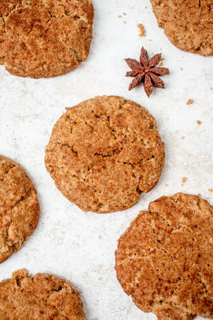 Dairy-free Paleo AIP Snickerdoodles with a decorative star anise on a countertop.