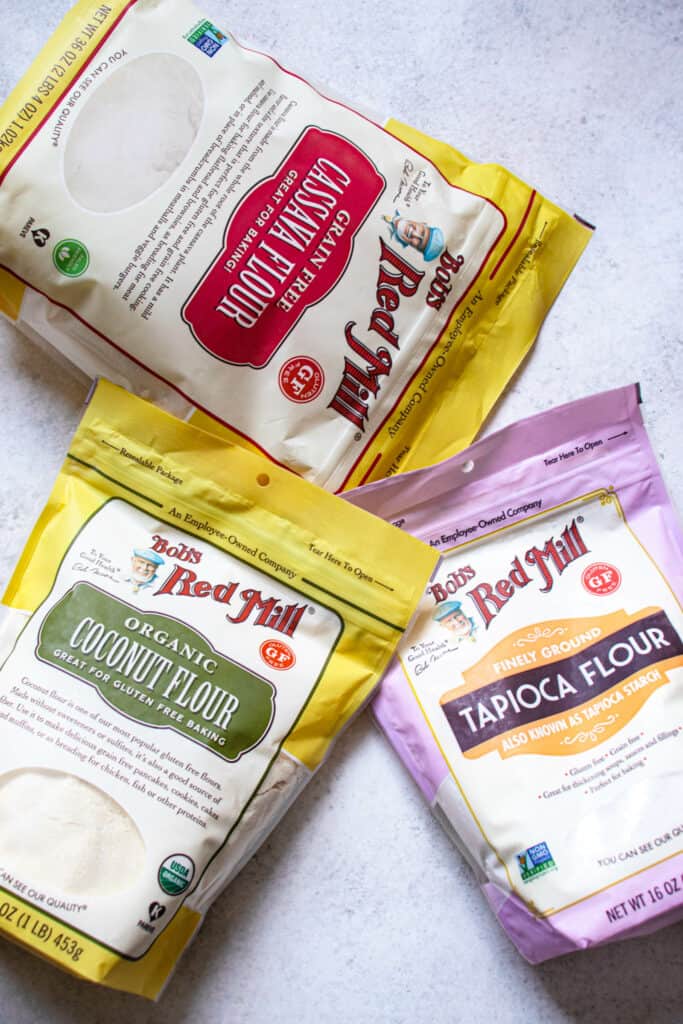 A bag of Bob's Red Mill Cassava Flour, Bob's Red Mill Tapioca Flour and Bob's Red Mill Organic Coconut Flour which comprise the grain-free blend of flour for the vegan gluten-free biscuits
