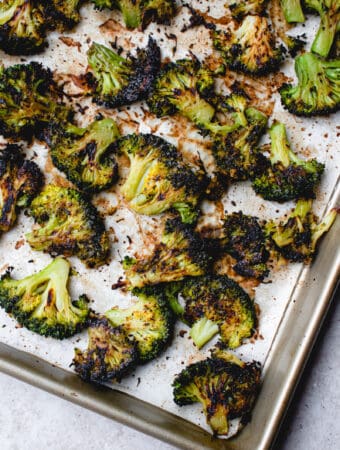 Oven-roasted smashed broccoli on a sheetpan