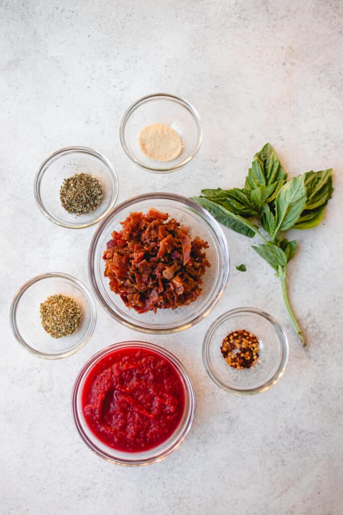 glass bowls with pizza roll ingredients