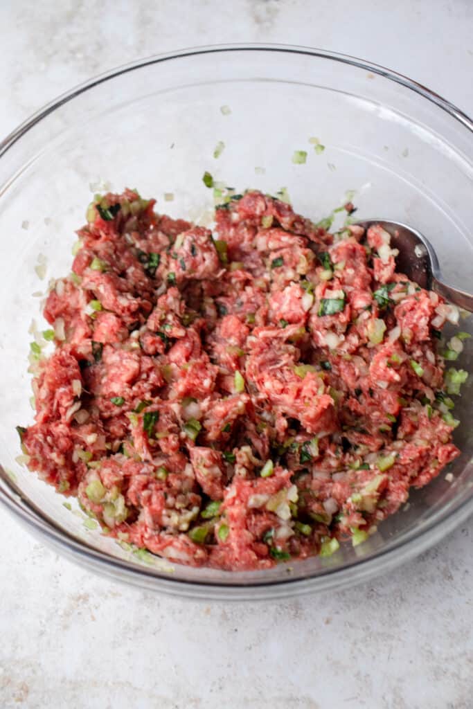 Glass bowl with seasoned ground beef