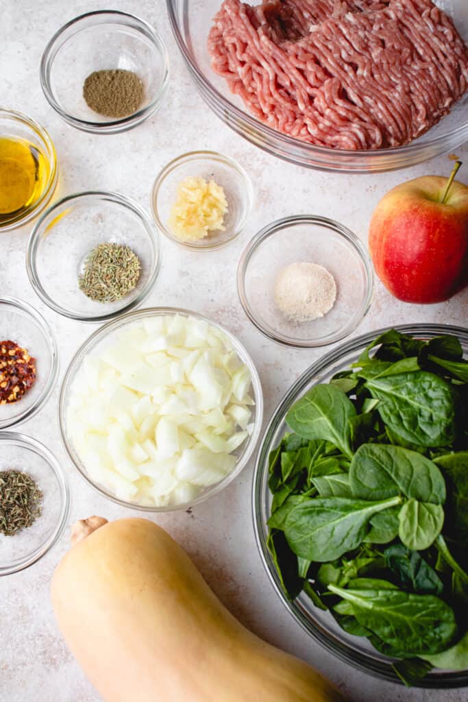 Overview of ingredients to make sheet pan butternut squash hash recipe.