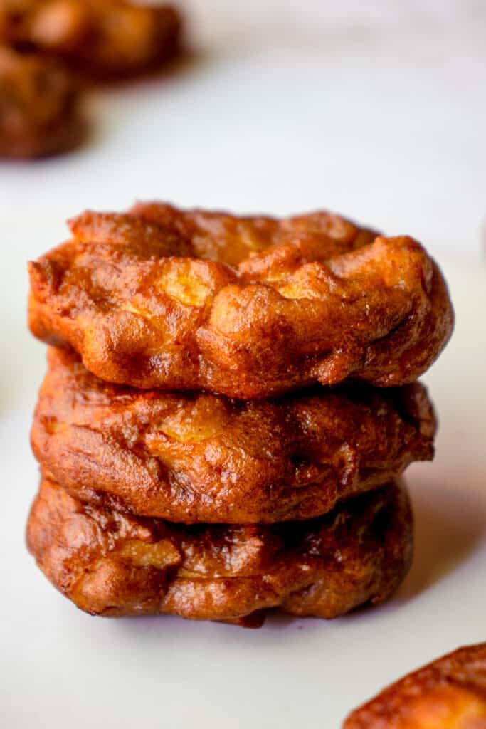 A stack of three Gluten Free Apple Fritters.