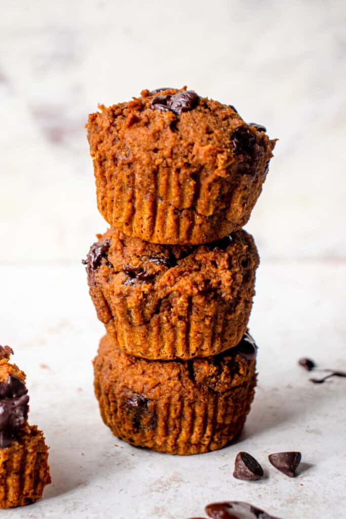 Stack of three Pumpkin Chocolate Chip Muffins (Gluten Free and Vegan).