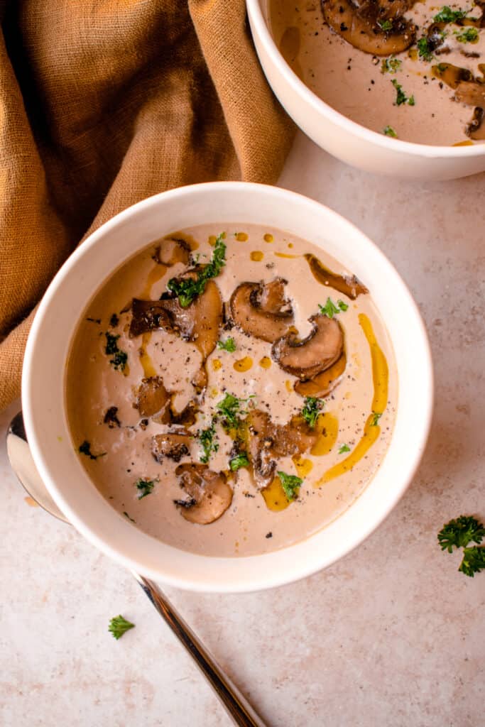 Gluten-Free Dairy-Free Cream of Mushroom Soup in two bowls.
