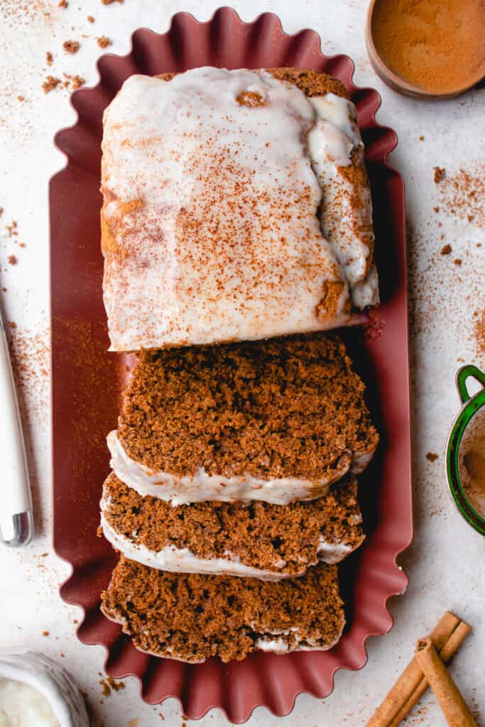 Gluten-Free Gingerbread Loaf topped with a coconut glaze.