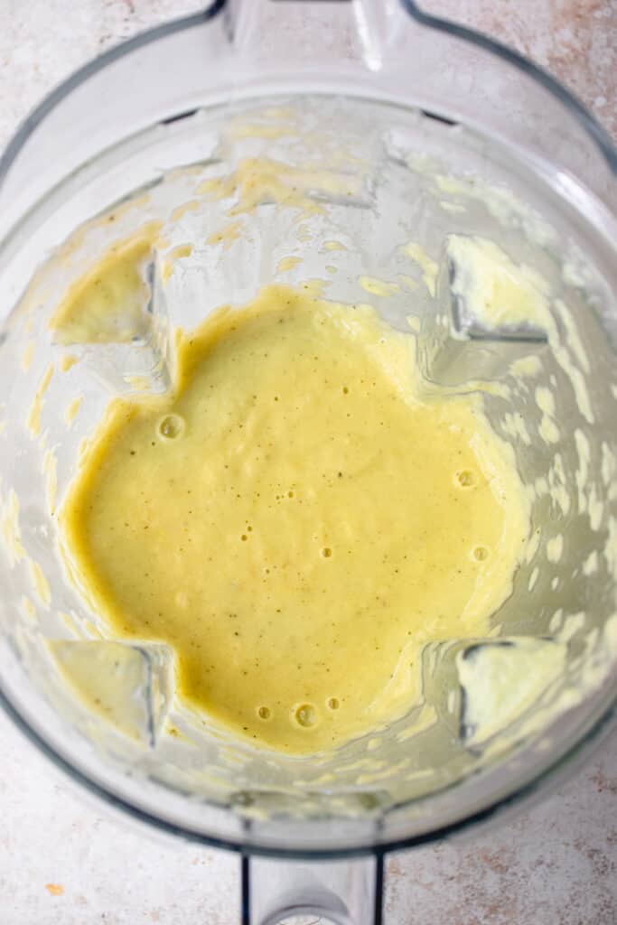 overhead shot of egg-free and dairy-free carbonara sauce in blender