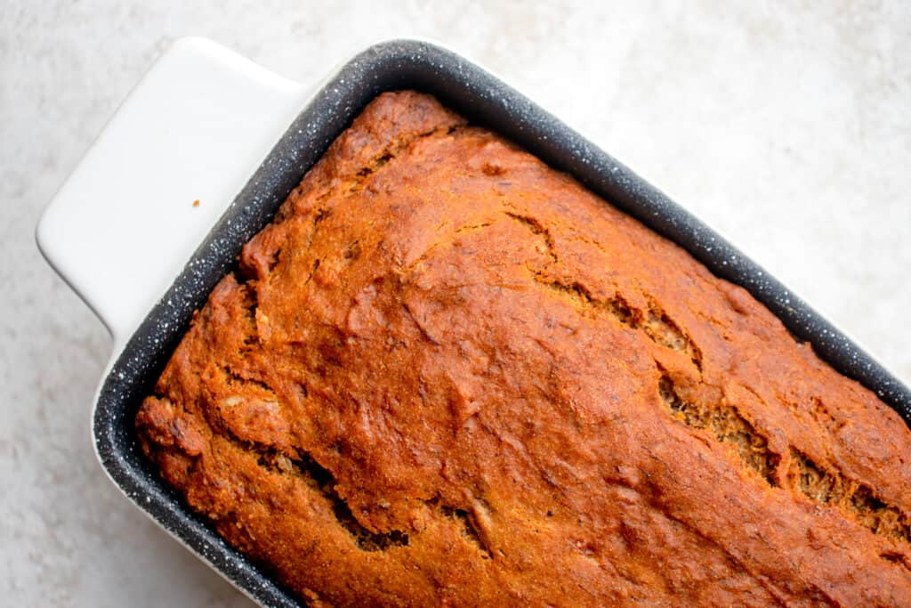 Baked Vegan Gluten-Free Banana Bread in a loaf pan.