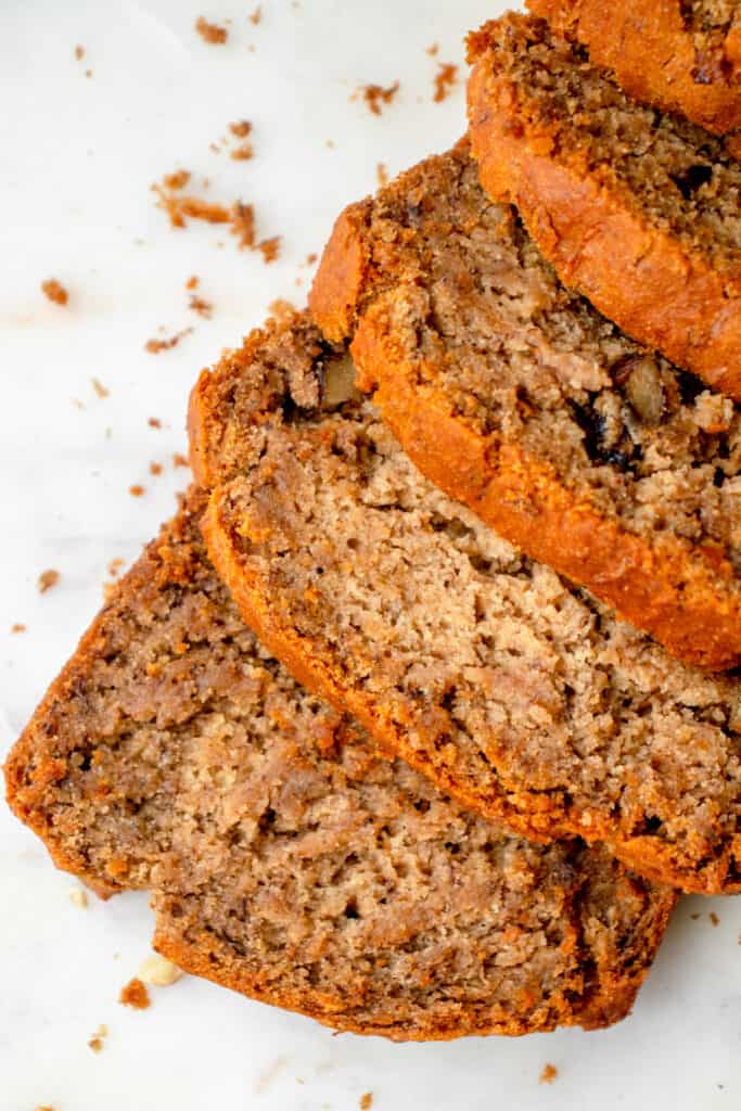 Overhead close up of four slices of Vegan Gluten-Free Banana Bread.