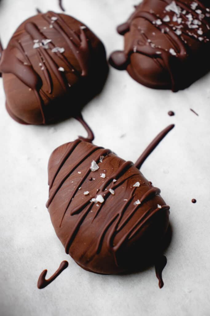 Chocolate Covered Easter Eggs drizzled with chocolate and sprinkled with coarse sea salt.