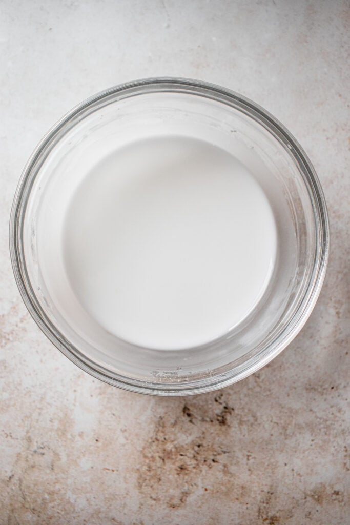 Tapioca starch with water slurry in a small glass bowl.