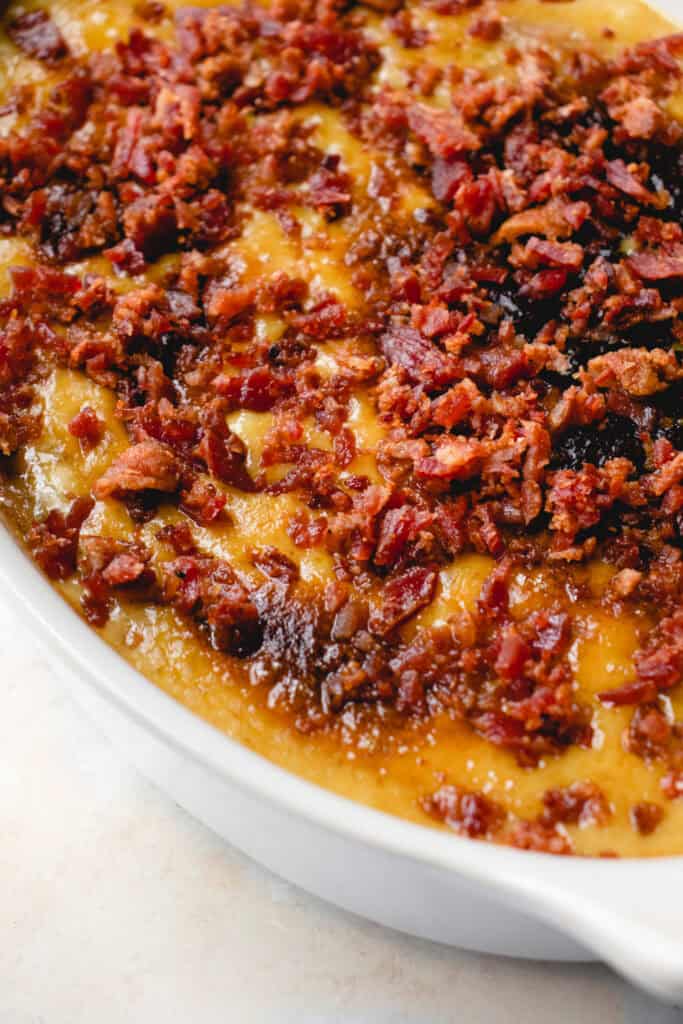 Bacon crumbled on top of the dairy-free cheese sauce finalizes the Cinco de Mayo Dip.