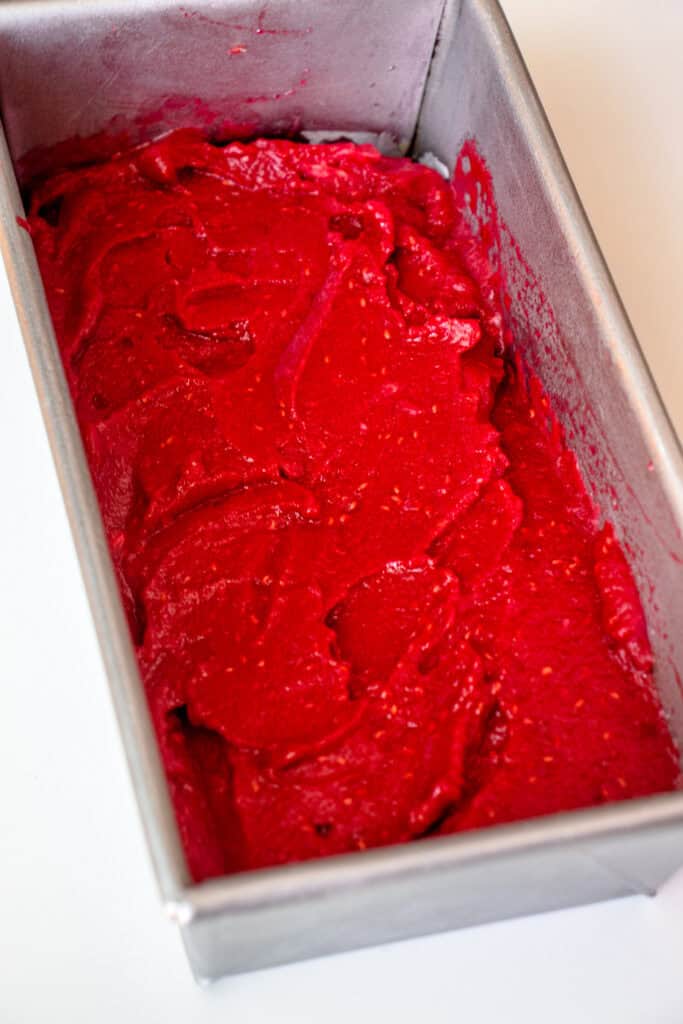 No-Churn Raspberry Sorbet with Oranges in a loaf pan.