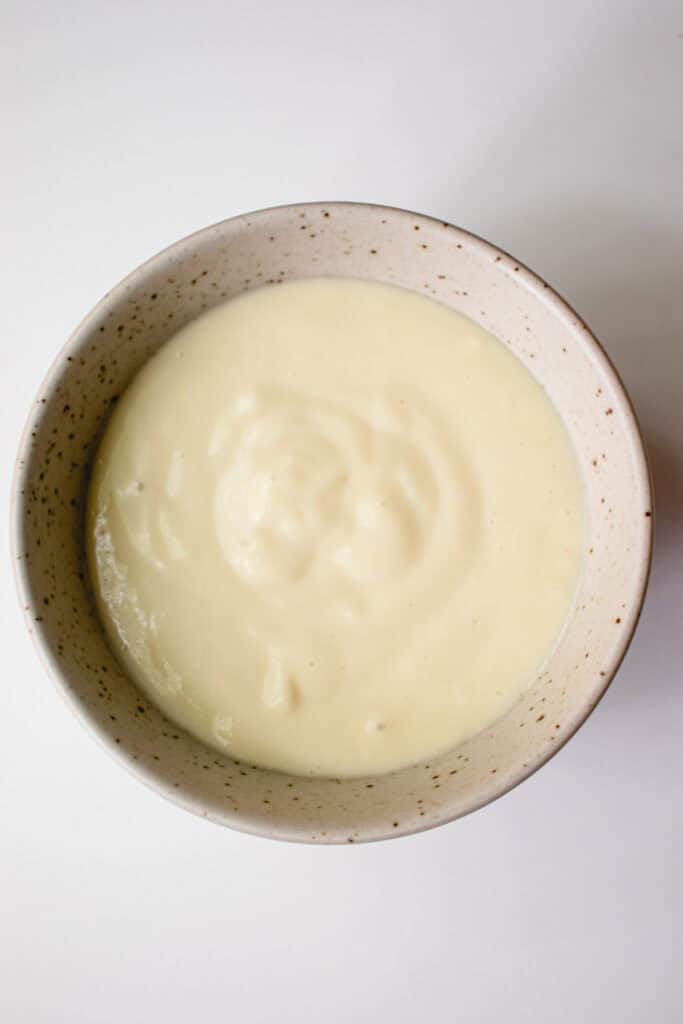 A bowl with creamy vegan custard.